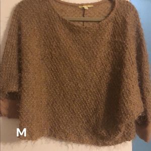 Sheer, short sleeve women’s shirt.